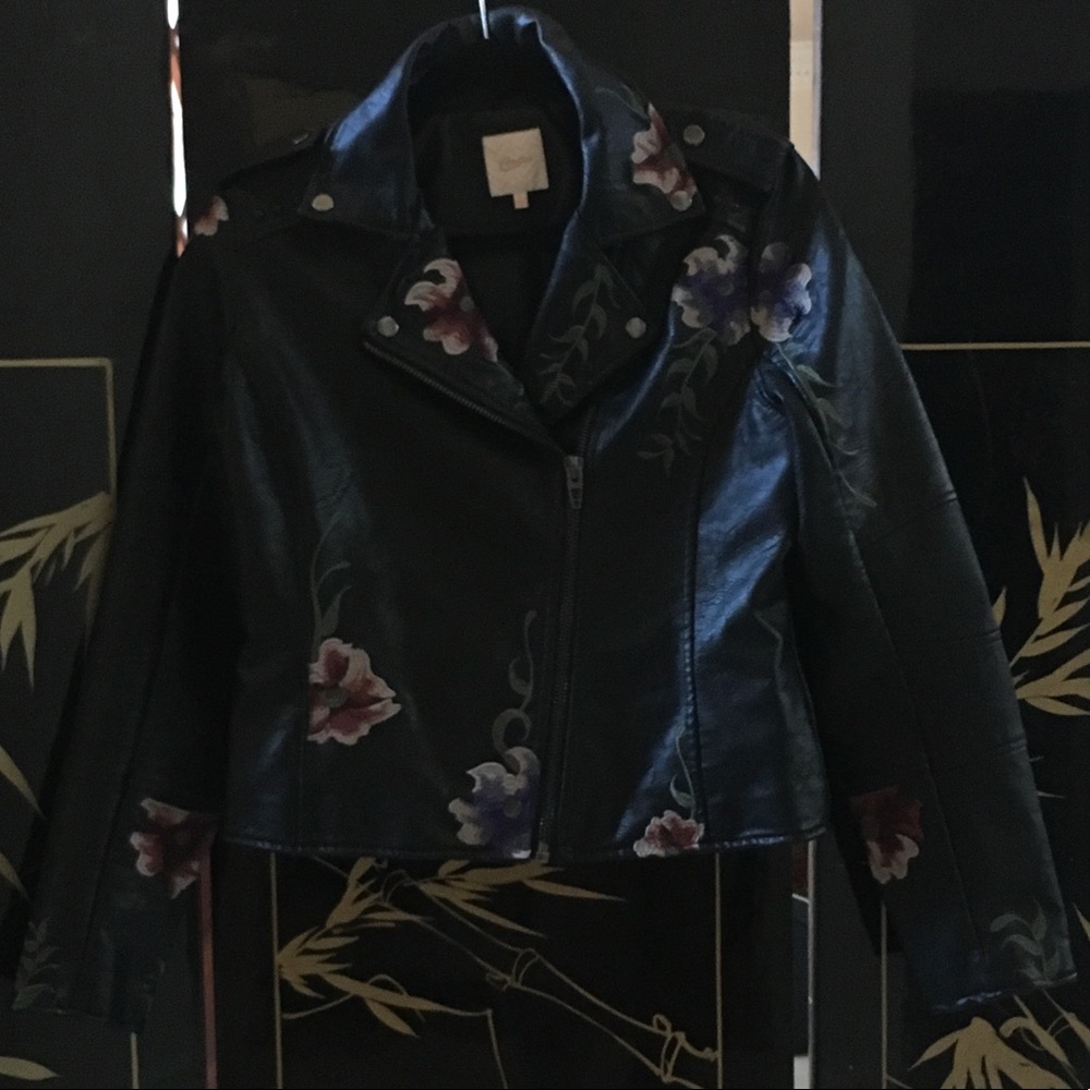 Black embroidered jacket.